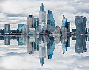 Mirror effect of London, UK city skyline and skyscrapers