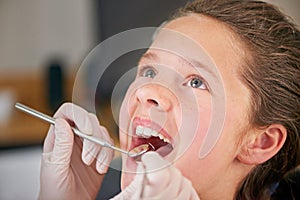 Mirror, hands and dentist with kid for teeth exam, healthcare and orthodontics in clinic. Dental hygiene, child and