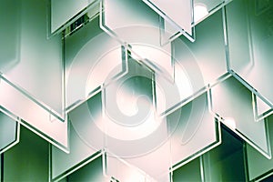 Mirror hanging, trim and reflection. Abstract glass background. Texture. Abstract white geometric hexagonal background