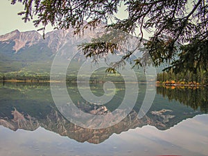 Mirror image of Pyramid Mountain in Autumn, Rocky Mountains