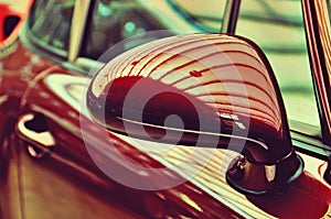 Mirror of the original cherry-old car. Retro style. Sophisticati