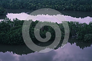 Mirror reflection on the lake in Sri Manning, Limit, Perak, Malaysia.