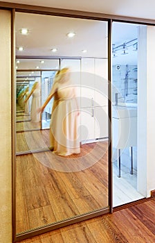 Mirror wardrobe in modern hall interior with infinity reflection