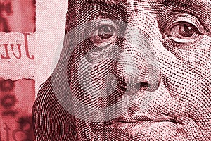 A mirrored image of Franklin`s face on an American 100 USD note. Memorable, conspicuous and tense illustration on the financial