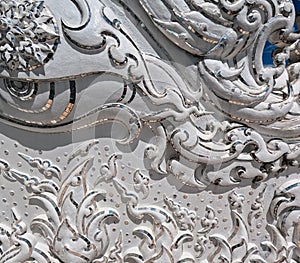 Mirrored ornamentation oriental Thai Architecture of Wat Rong Khun