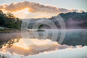 Mirrored sunrise on Rydal Water, in the Lake District