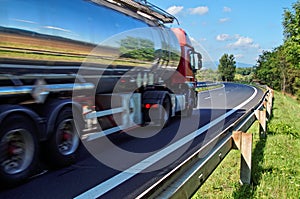 Mirroring the landscape chrome tank truck