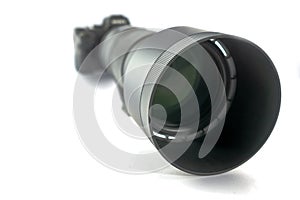 Mirrorless system camera with ultratele telezoom 150mm to 600mm with focus on the front part of the sun visor