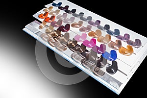 Miscellaneous various samples color palette dye coloring hair shade tint on black and white background isolated