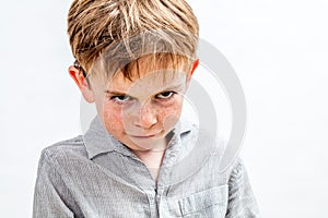 Mischievous bully child expressing revenge, retaliation or attitude problem, isolated