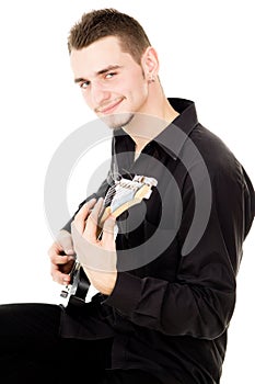 Mischievous guy plays the electric guitar