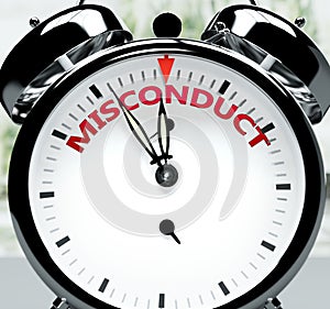 Misconduct soon, almost there, in short time - a clock symbolizes a reminder that Misconduct is near, will happen and finish