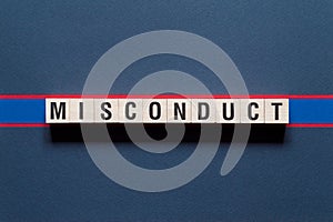 Misconduct word concept on cubes