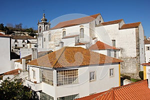 Misericordia Church and whitewashed houses. Obidos. Portugal photo