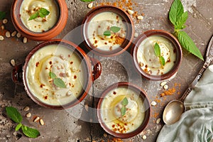 Mishti Doi, Traditional Bengali Food, Sweet Creamy Yogurt Dessert with Caramelized Sugar in Clay Pots photo