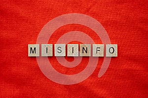 Misinformation concept with tile lettering