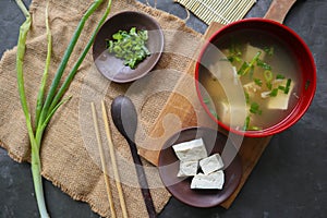 miso soup or Japanese miso soup in bowl on the table. Japanese cuisine in the form of soup with dashi ingredients, tofu, seafood,