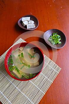 miso soup or Japanese miso soup in bowl on the table. Japanese cuisine in the form of soup with dashi ingredients, tofu, seafood,