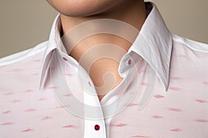 misplaced lipstick mark on a mens shirt collar