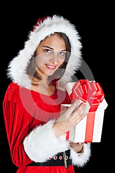 Miss Santa opening a gift box