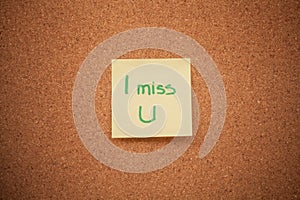 Miss you note on cork board