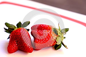Misshapen fresh produce plump strawberries