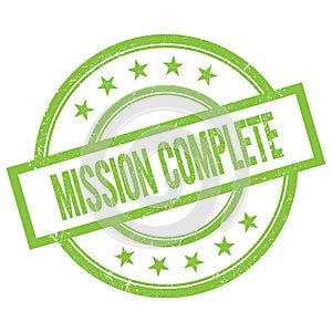 MISSION COMPLETE text written on green vintage stamp