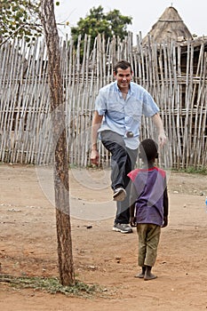 Missionary playing with child