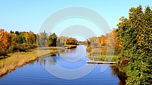Mississippi River flows north toward Bemidji Minnesota in autumn clip.