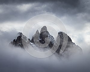 Mist-clad peaks of a mountain range