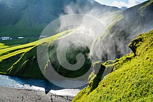 Mist of famous Skogafoss Waterfall, Iceland,