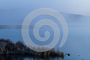 Mist of lake in the early morning