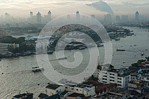 The mist in the morning. Landscape of The Chao Phraya river and Bangkok city, Thailand.