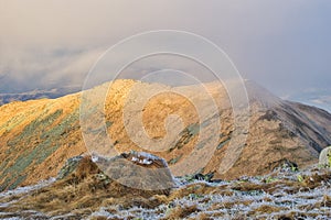 Mist over Chabenec mountain during autumn in Low Tatras mountains