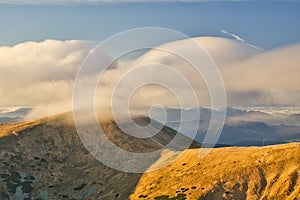 Mist over Chabenec mountain during autumn in Low Tatras mountains