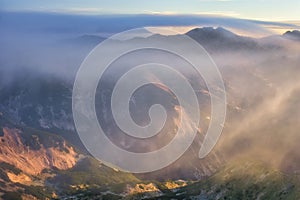 Mist over Chopok mountain, view from Skalka mountain during autumn in Low Tatras mountains