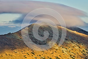 Mist over Dumbier mountain during autumn in Low Tatras mountains