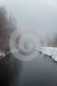 Mist over a narrow channel in Nykroppa sweden