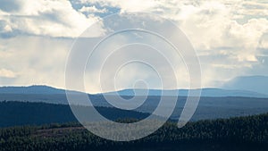 Mist and rain over forest and mountains in Idre, Sweden