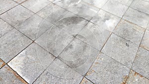 Mist Rises From Urban Pavement Tiles in Early Morning. Background, texture, pattern, copy space,