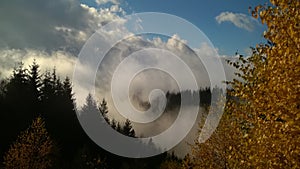 Mist in the woods and mountains during autumn.