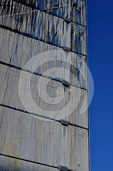 misted windows with drops of moisture. offices with a glass