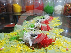 Misti pan, betel nut garnished with all bangali misti paan ingredients for sale.