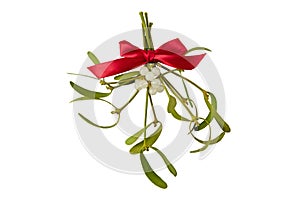 Mistletoe bunch with red satin bow isolated on white photo