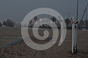 Misty beach at sunrise photo