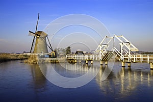 Misty and calm windmill bridge