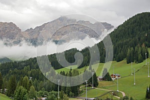 Misty and cloudy alpine landscape