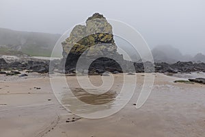 Misty coast at Ballintoy Harbor, Ballycastle