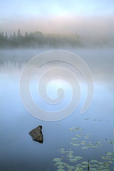 Misty Dawn on a Lake in Ontario, Canada