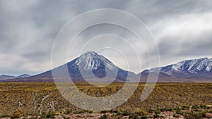 Misty day over Licancabur volcano in Atacama